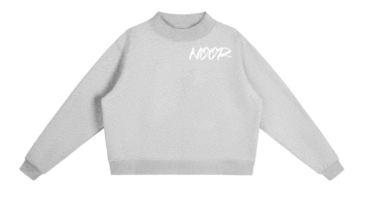 Gray sweatshirt with 'NOOR' text on a white background